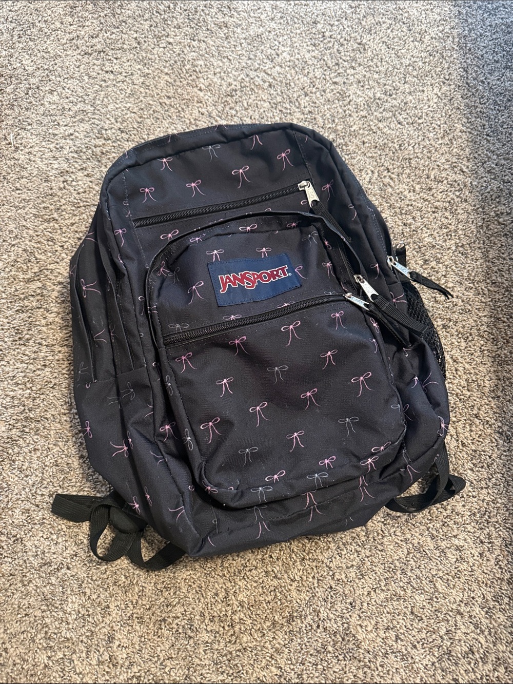 Jansport Black Backpack with Pink Bow Print